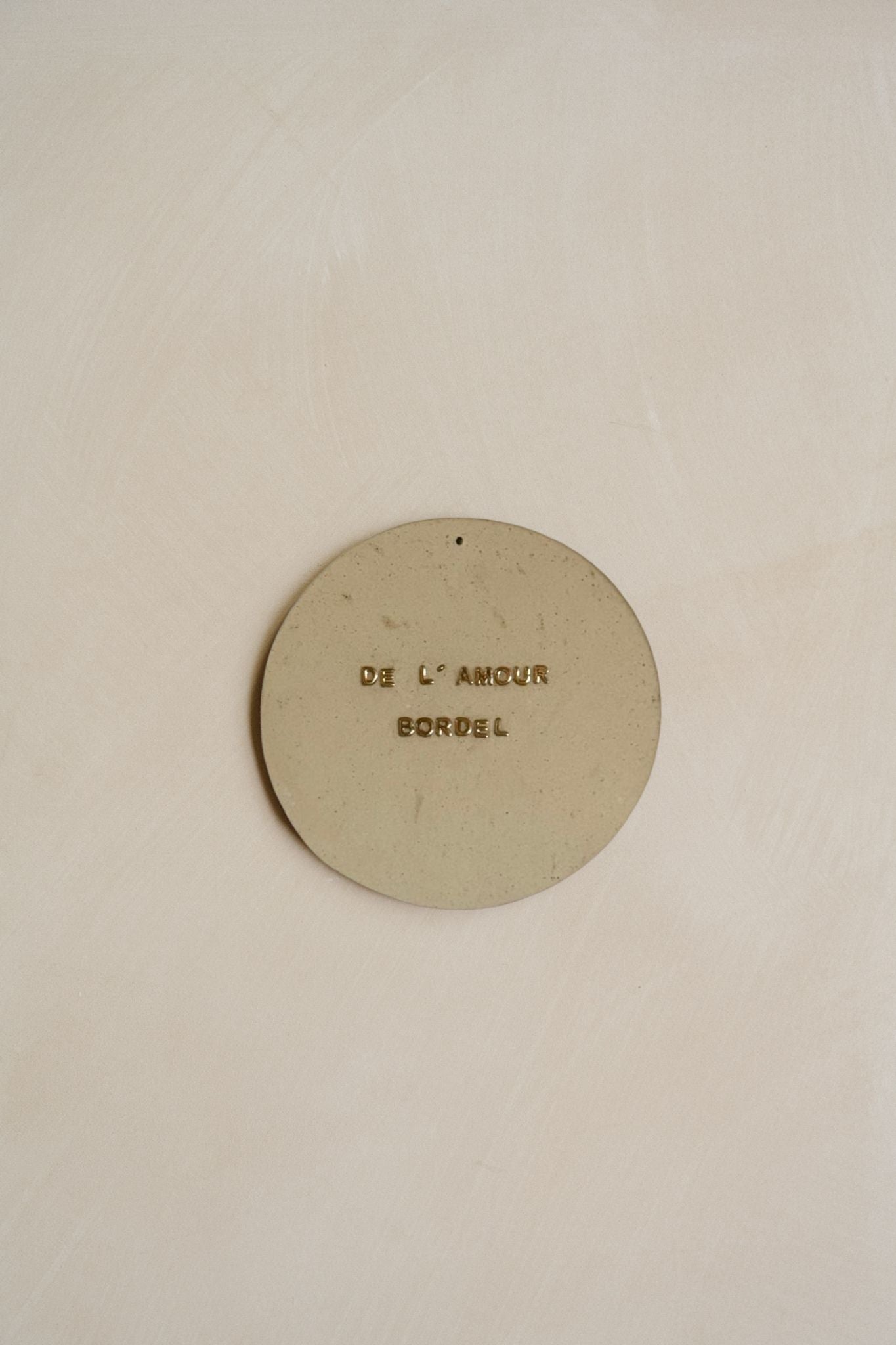 Plaquette décorative “DE L'AMOUR BORDEL”