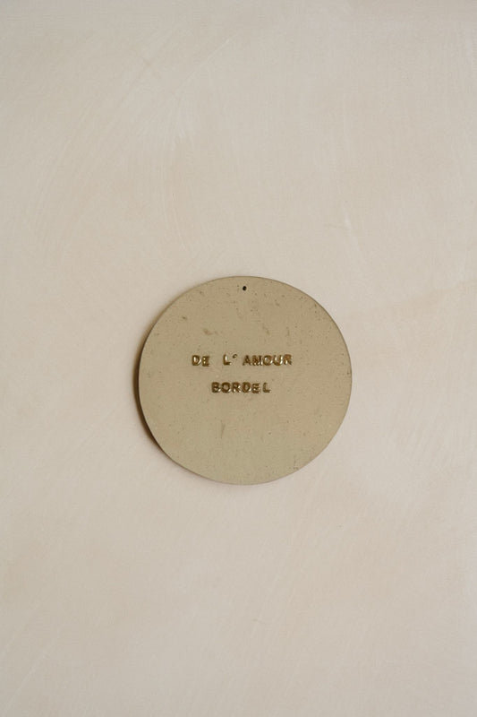 Plaquette décorative “DE L'AMOUR BORDEL”